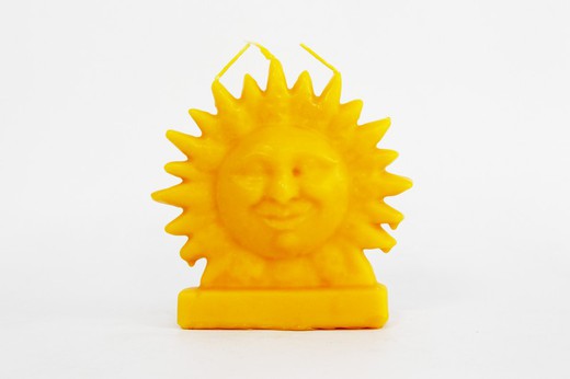 Yellow sun candle