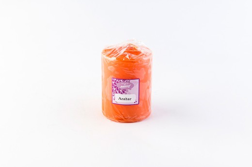 Small orange scented candle